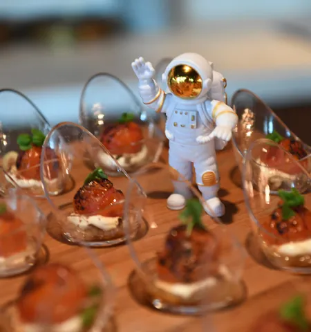 space-themed food with an astronaut figurine