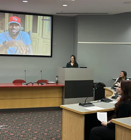 Students and a professor in a John Glenn College of Public Affairs class talk to LeBron James via Zoom.