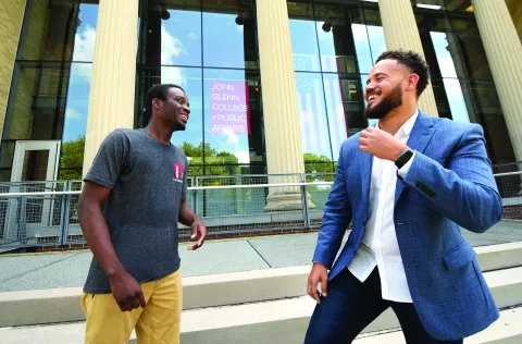 Gabe Jackson and Kenneth Blacks in front of Page Hall