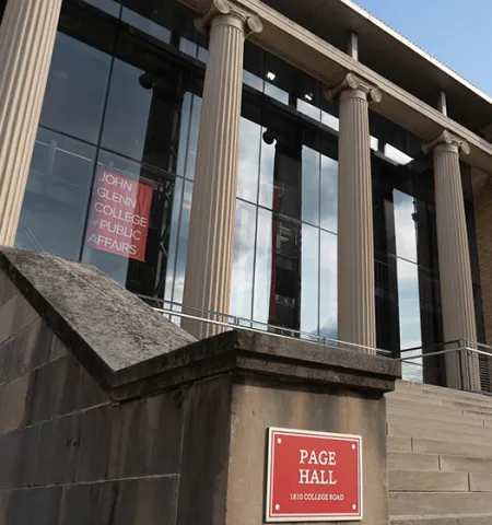 The front steps, building sign and windows of Page Hall, home of the John Glenn College of Public Affairs at The Ohio State University