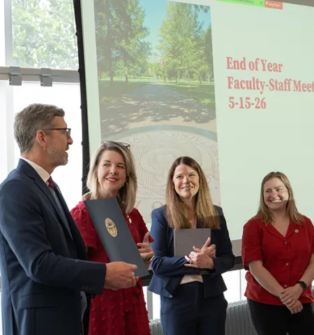 Former Glenn College Dean Trevor Brown, left, stands with (from left) Rep. Allison Russo, Acting Dean Stephanie Moulton and Rep. Christine Cockley.